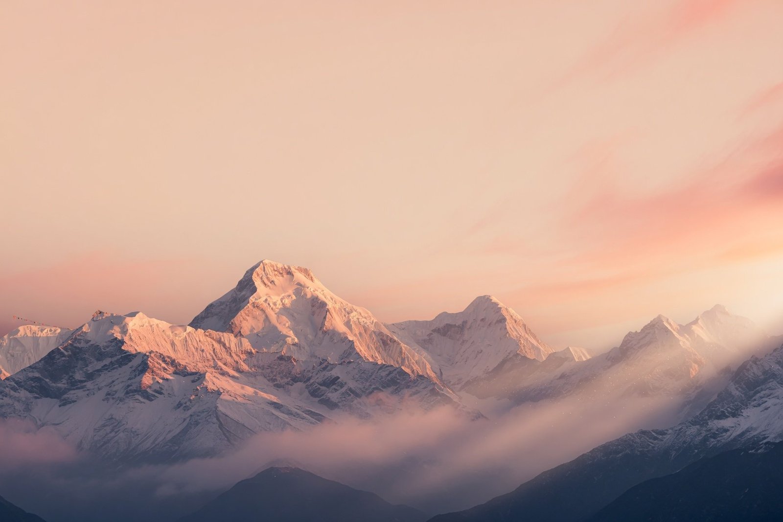 Snow-capped Himalayan mountain range at dawn